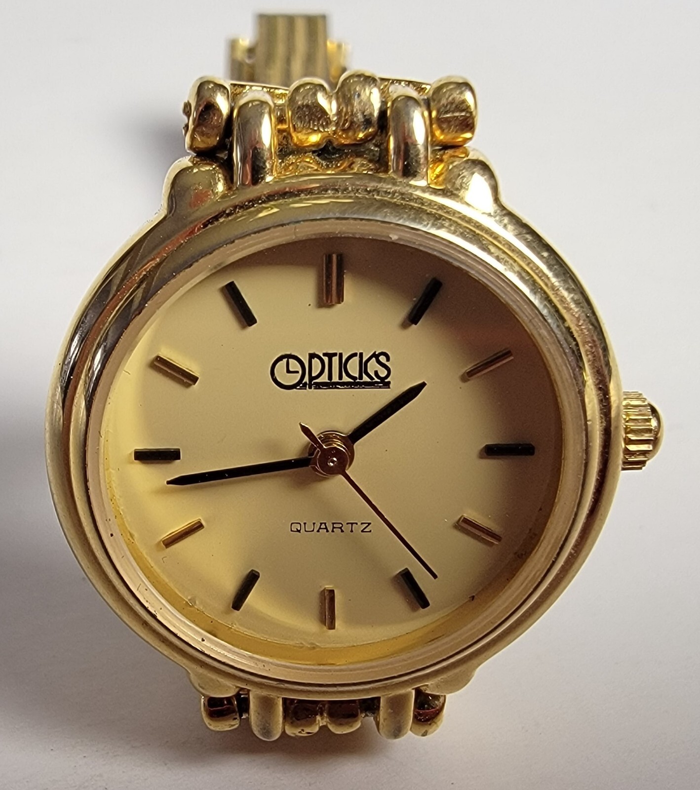 Opticks women quartz gold tone bracelet watch by Celebrity Watch International