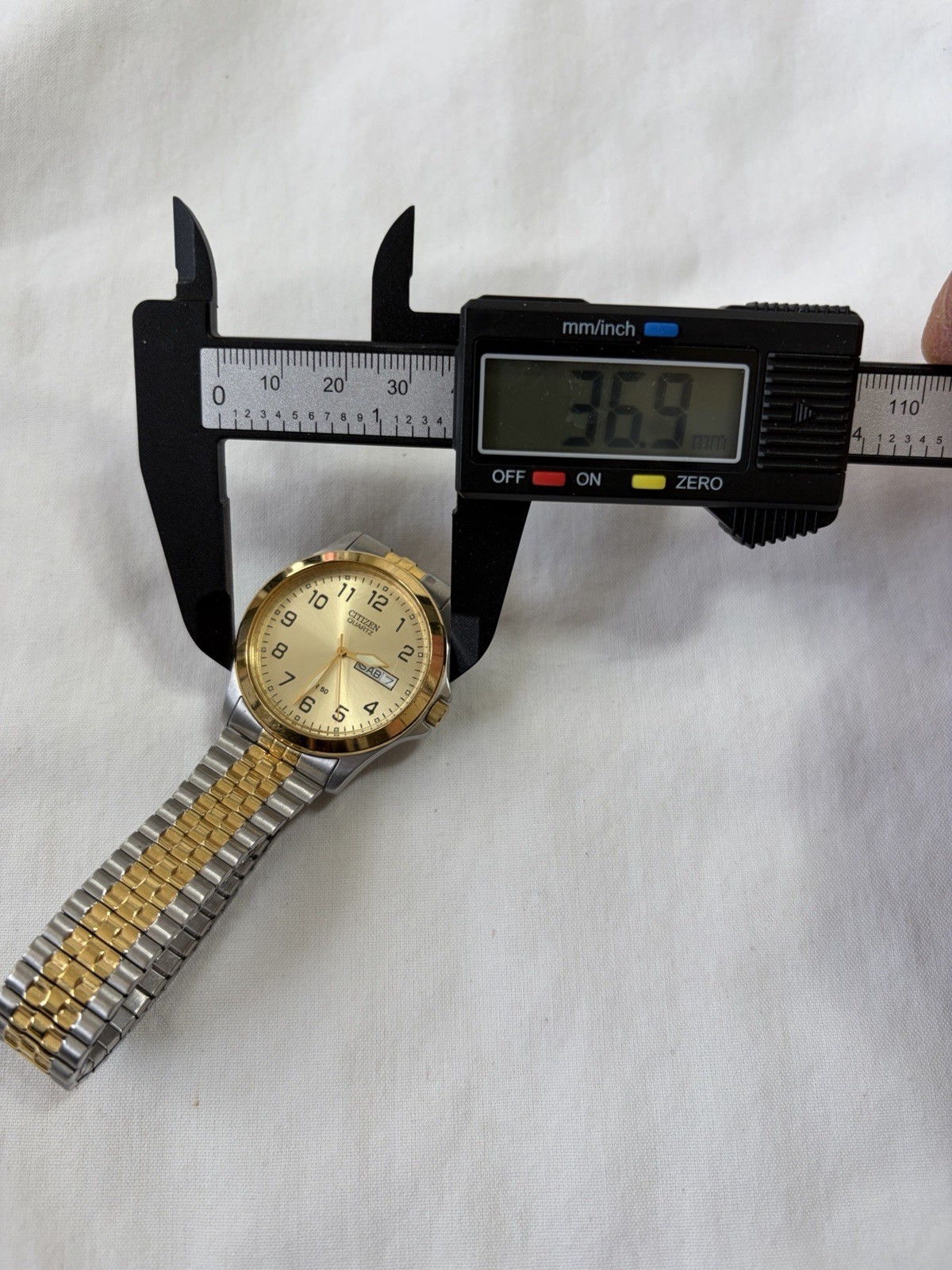 Citizen Quartz 1102-S056039 Men’s Two Tone Day Date Champ Dial Expand Band