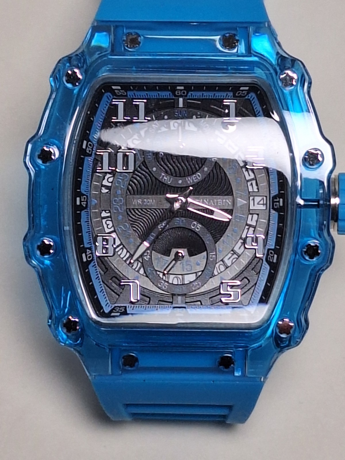 Tinaibin Skeleton Dial Transparent Tonneau-shaped Case. Blue / Silver Watch