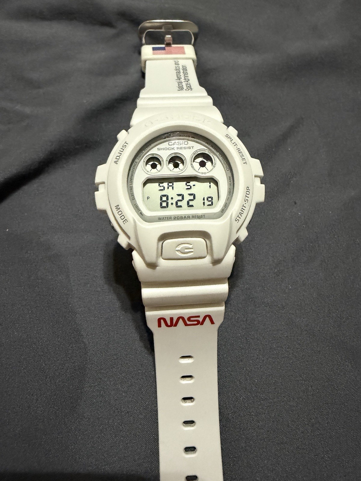 Casio Men’s G-Shock DW6900NASA237 Watch White Resin Case and Strap