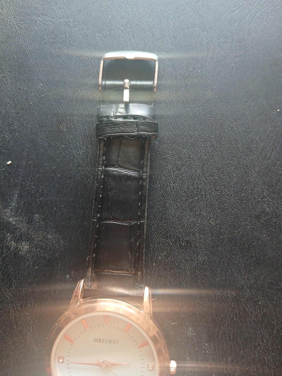 Mreurio White Dial Round Gold Tone Case Black Leather Band Watch