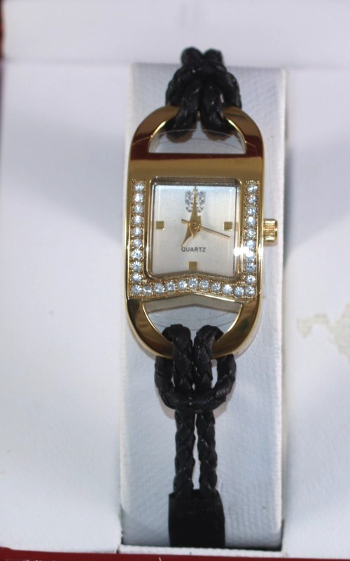 Paolo Gucci Gold Tone Ladie’s watch on a cord New in Box