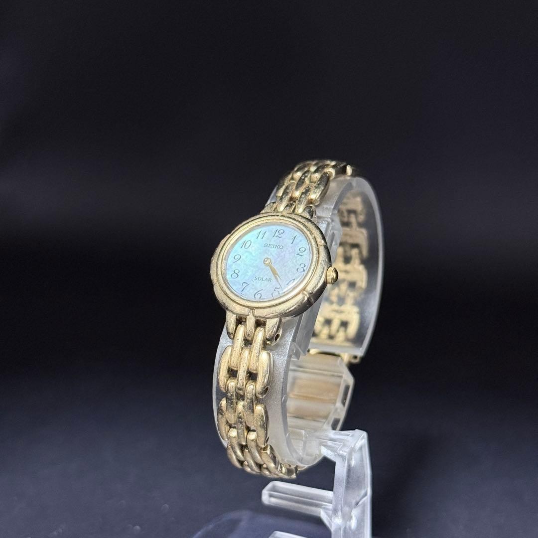SEIKO V110-0A70 Watch with Chain and Shell Dial