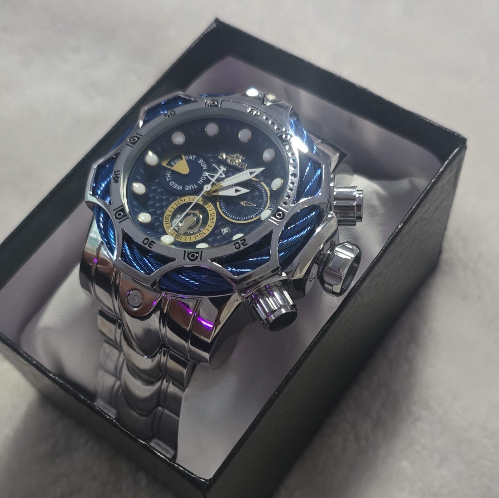 Invicta Bolt Men’s Quartz Blue Textured Dial Silver Bracelet Day/Date Box