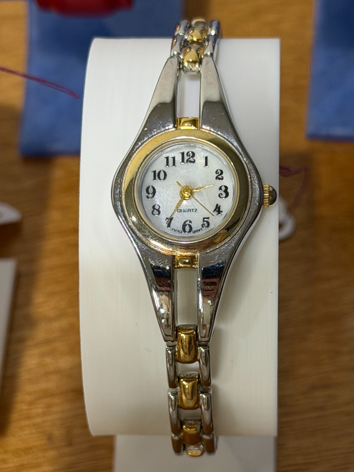 Ladies Quartz Watch Two-Tone Oval Case MOP Dial Arabic Numerals Bracelet