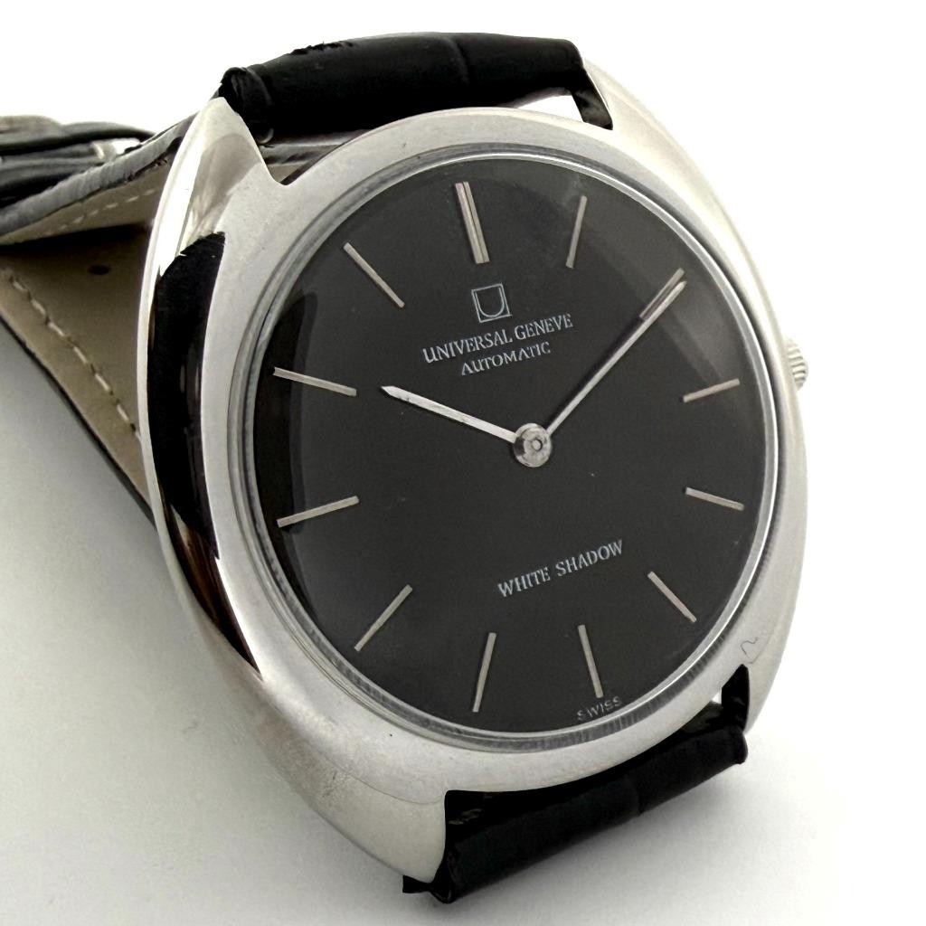 ELEGANT UNIVERSAL WHITE SHADOW MICRO-ROTOR THIN CAL 2–66 VINTAGE BLACK DIAL