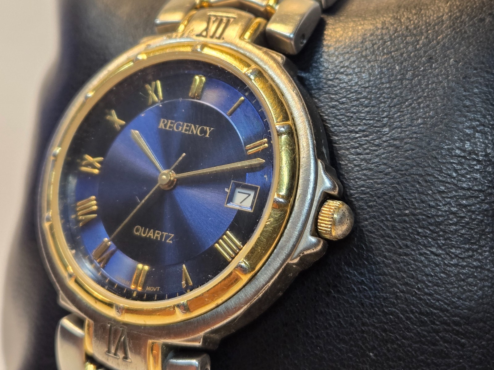 Regency Quartz Analog Wristwatch Dark Blue Dial Roman Date Two-Tone Bracelet