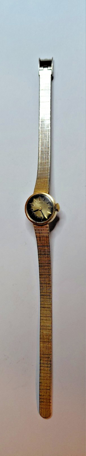 Title: Vintage Timex Gold Manual Wind Watch Running.