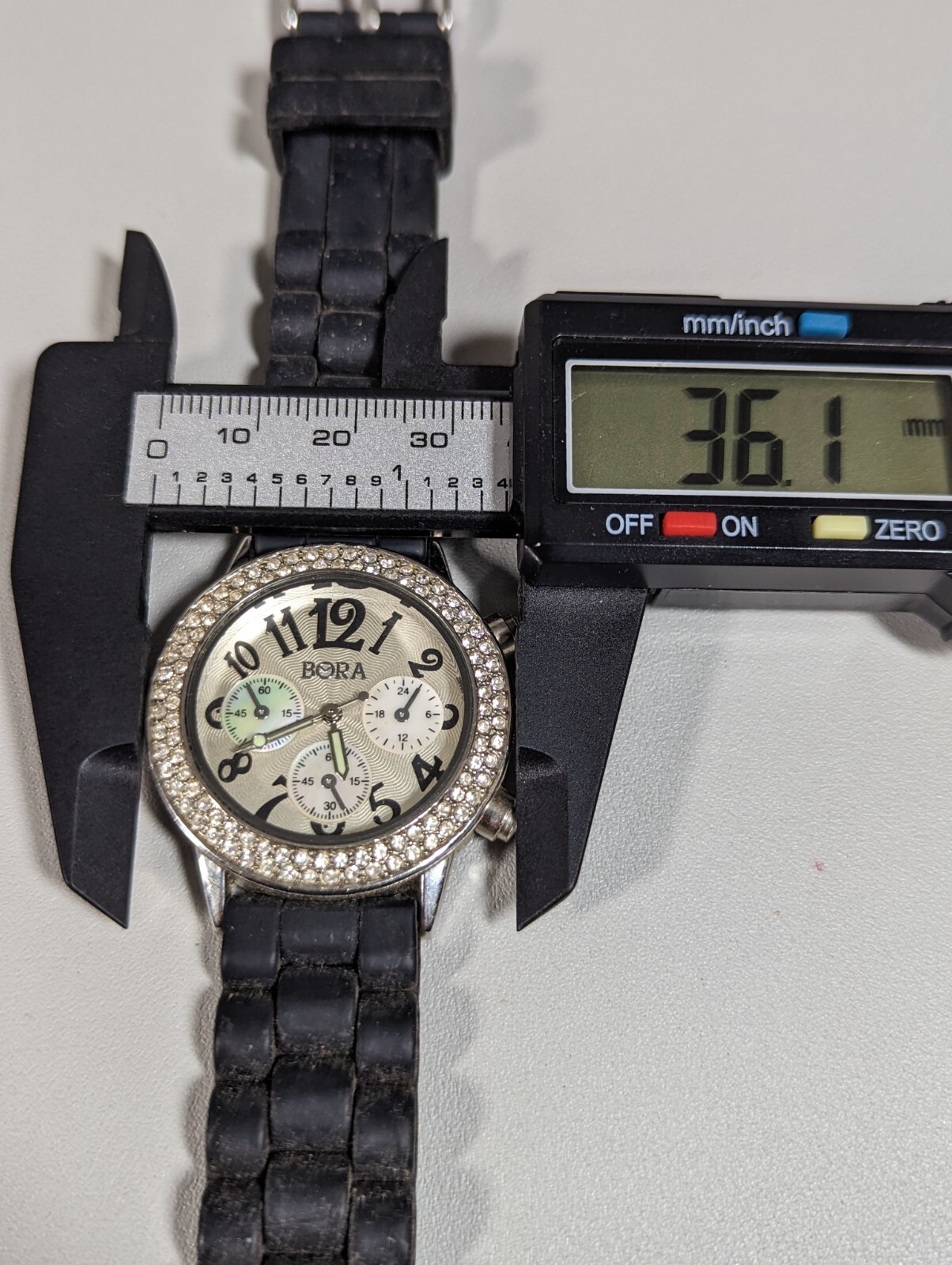Bora Silver Tone Crystal Accent Round Case Black Silicone Band Watch