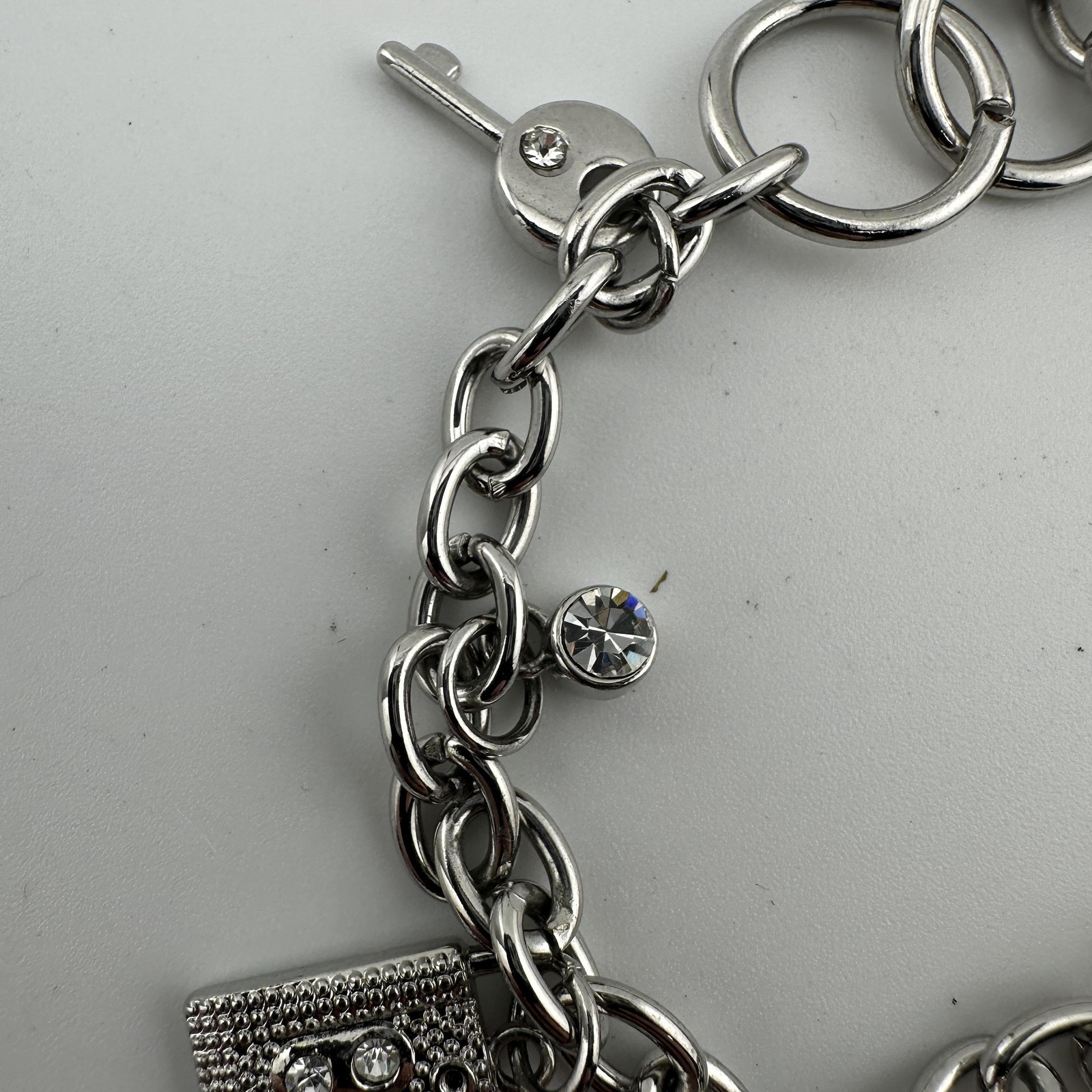 Charm Sz 8.7″ Bracelet Watch Womens White Dial Silver Tone Key Lock Ring Charms