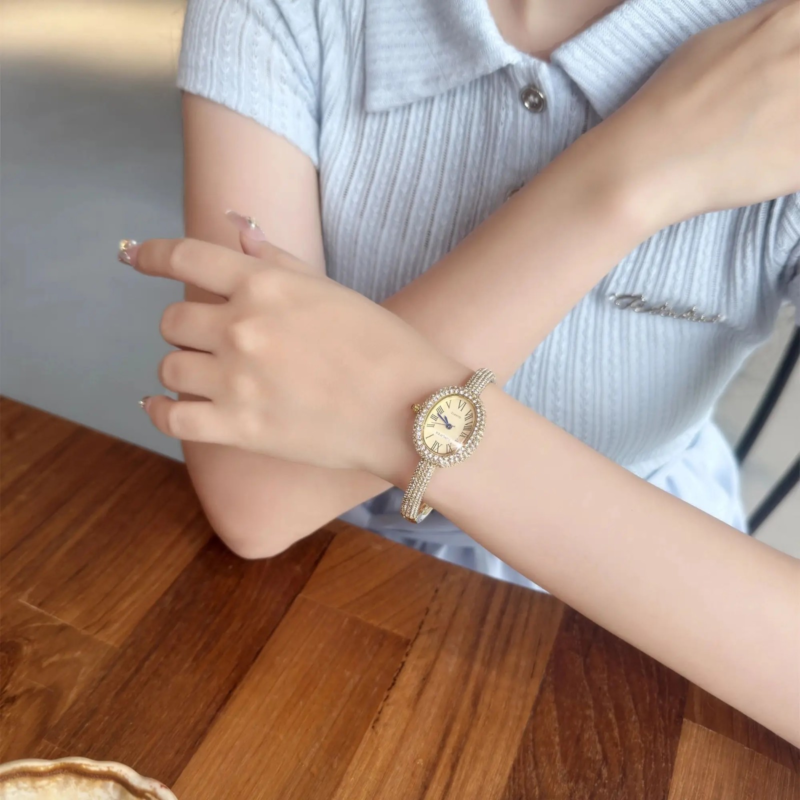 Luxury Crystal Oval Bangle Watch For Women Roman Numeral Dial Rhinestone Inlaid