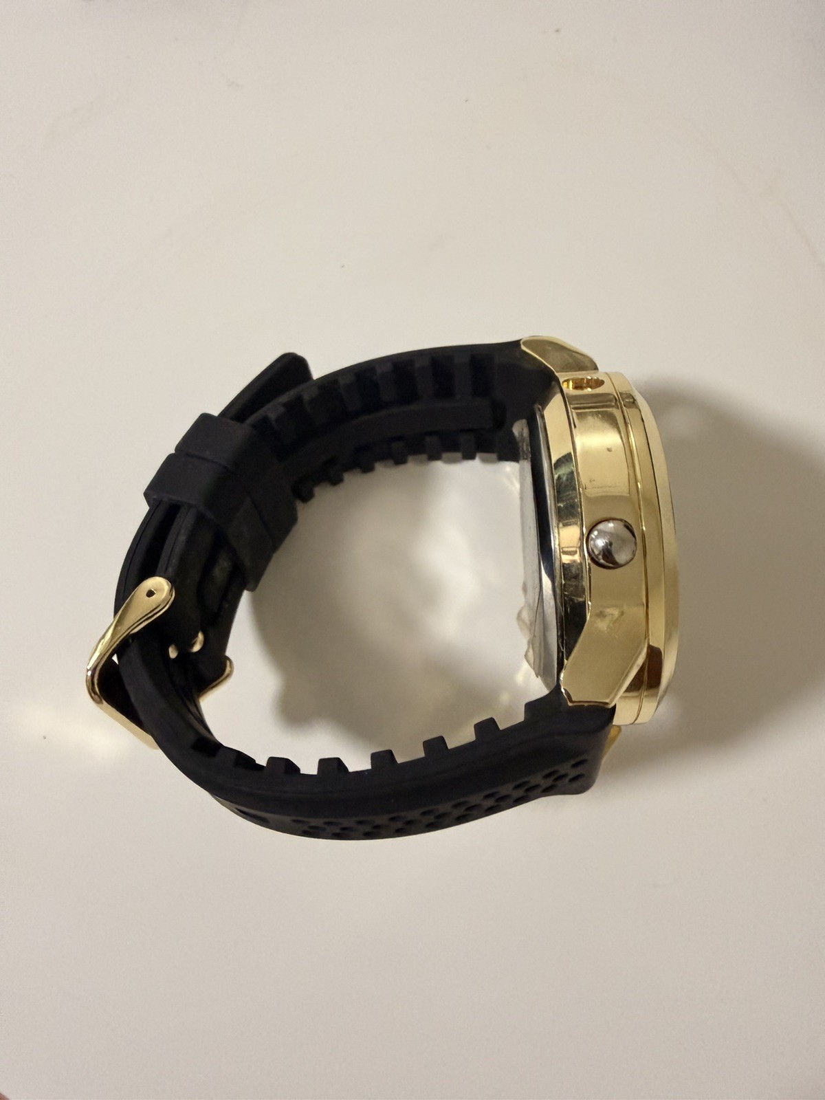 Kenneth Cole Reaction watch for menGold with black Silicone Band