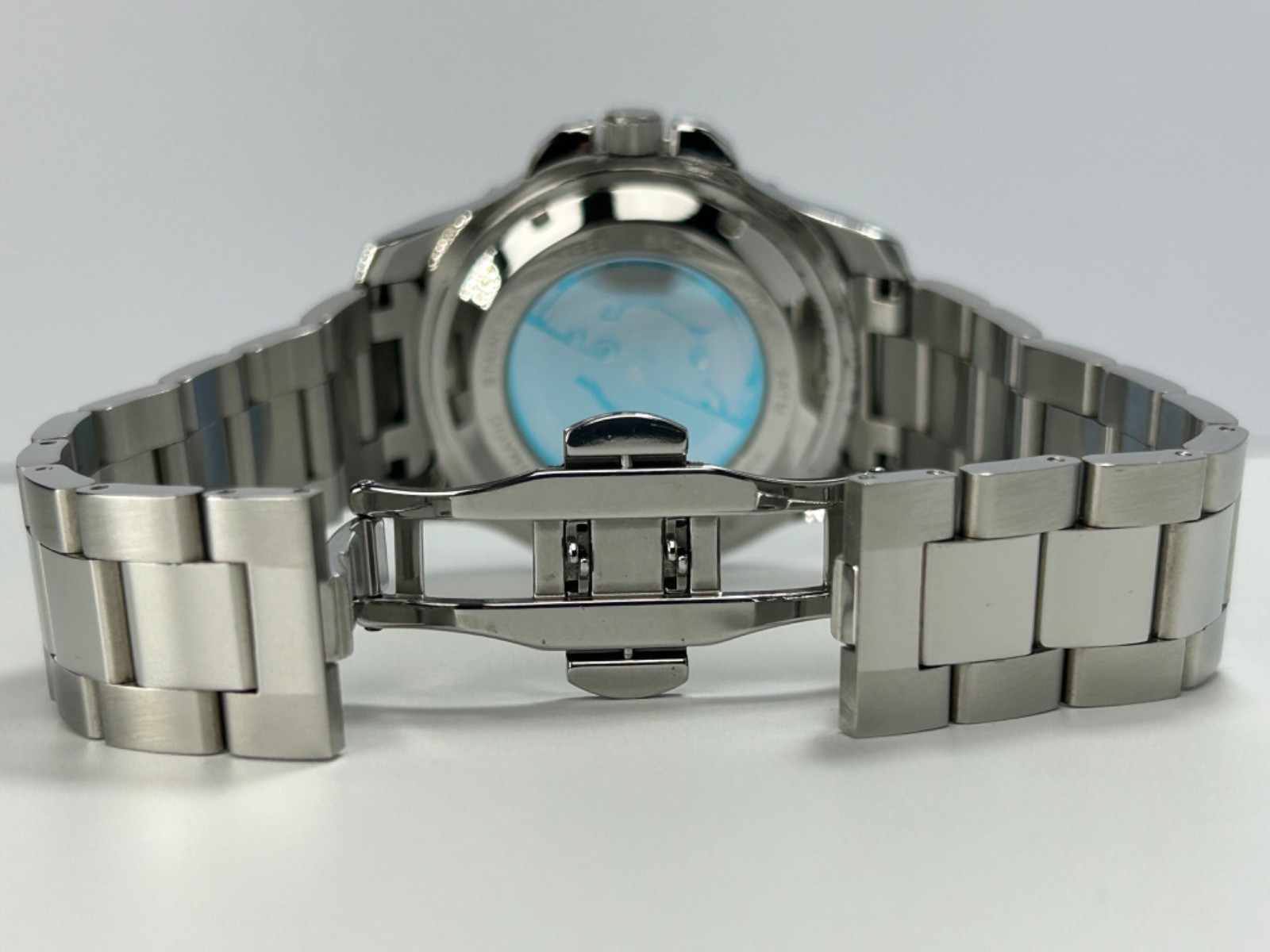 Nibosi NI2596 Mens Automatic 42MM Day/Date Silver Tone Blue Dial Exhibition Back