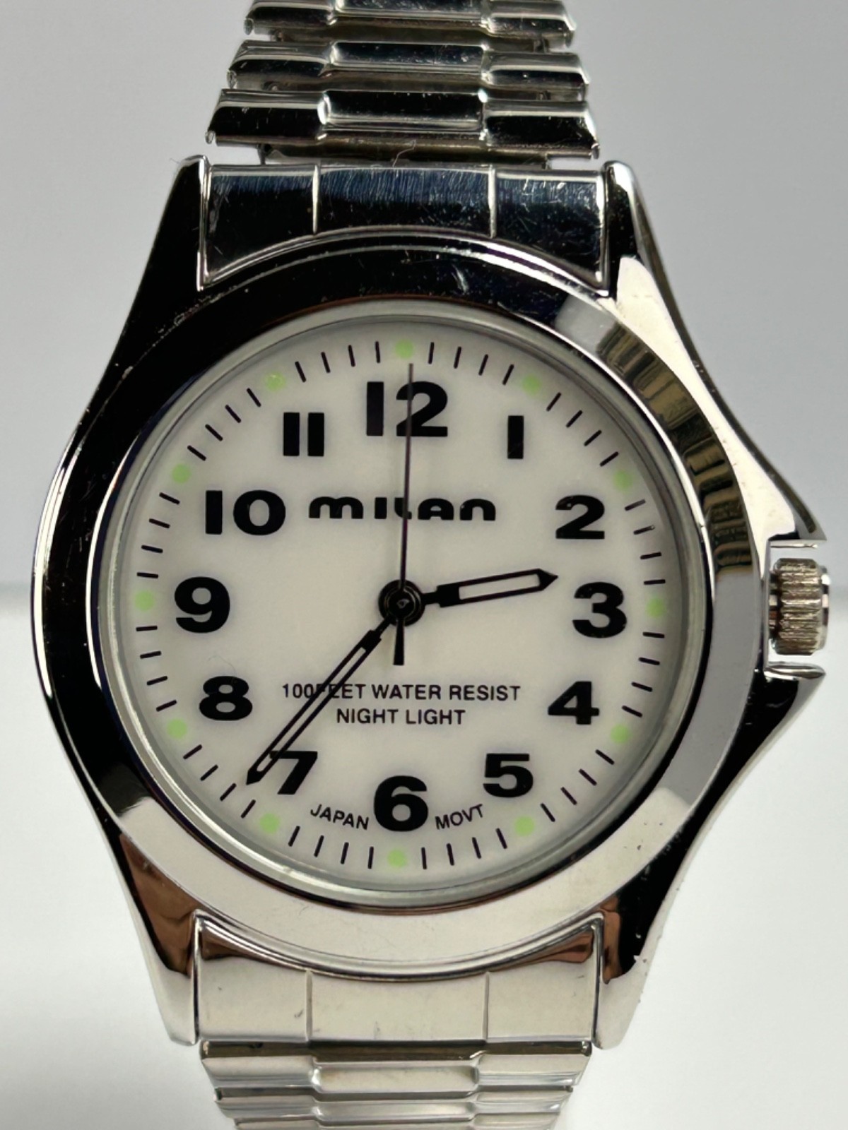 Vintage Milan MLN37601W “Night Light” 38MM Quartz Silver/White Dial Stretch Band