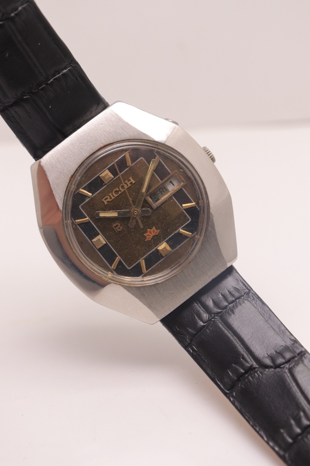 Vintage Ricoh automatic Day Date Movement R31 Japan made men’s watch.