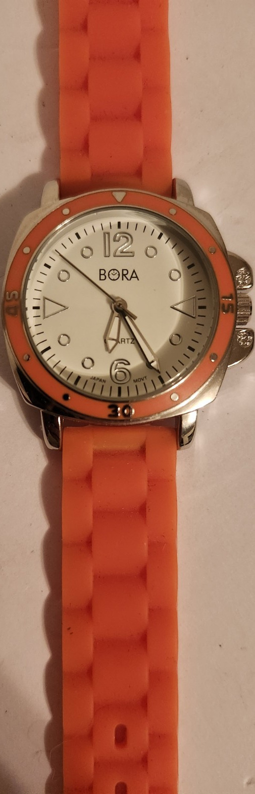 BORA Quartz Analog Wristwatch White Dial Silver Case Orange Rubber Band Women