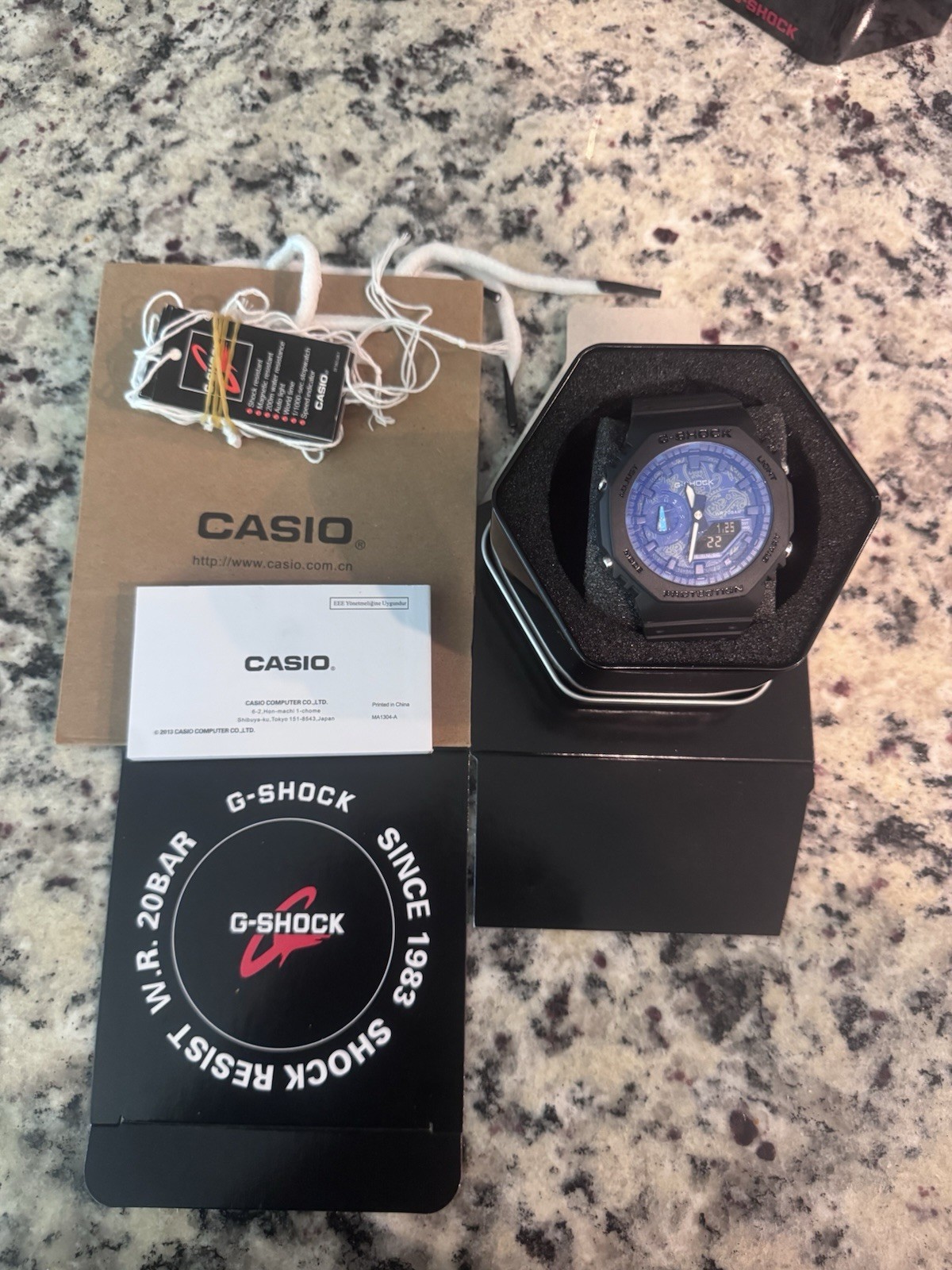 Shock-Resistant Black Resin Octagon Blue Dial w/ Box Papers