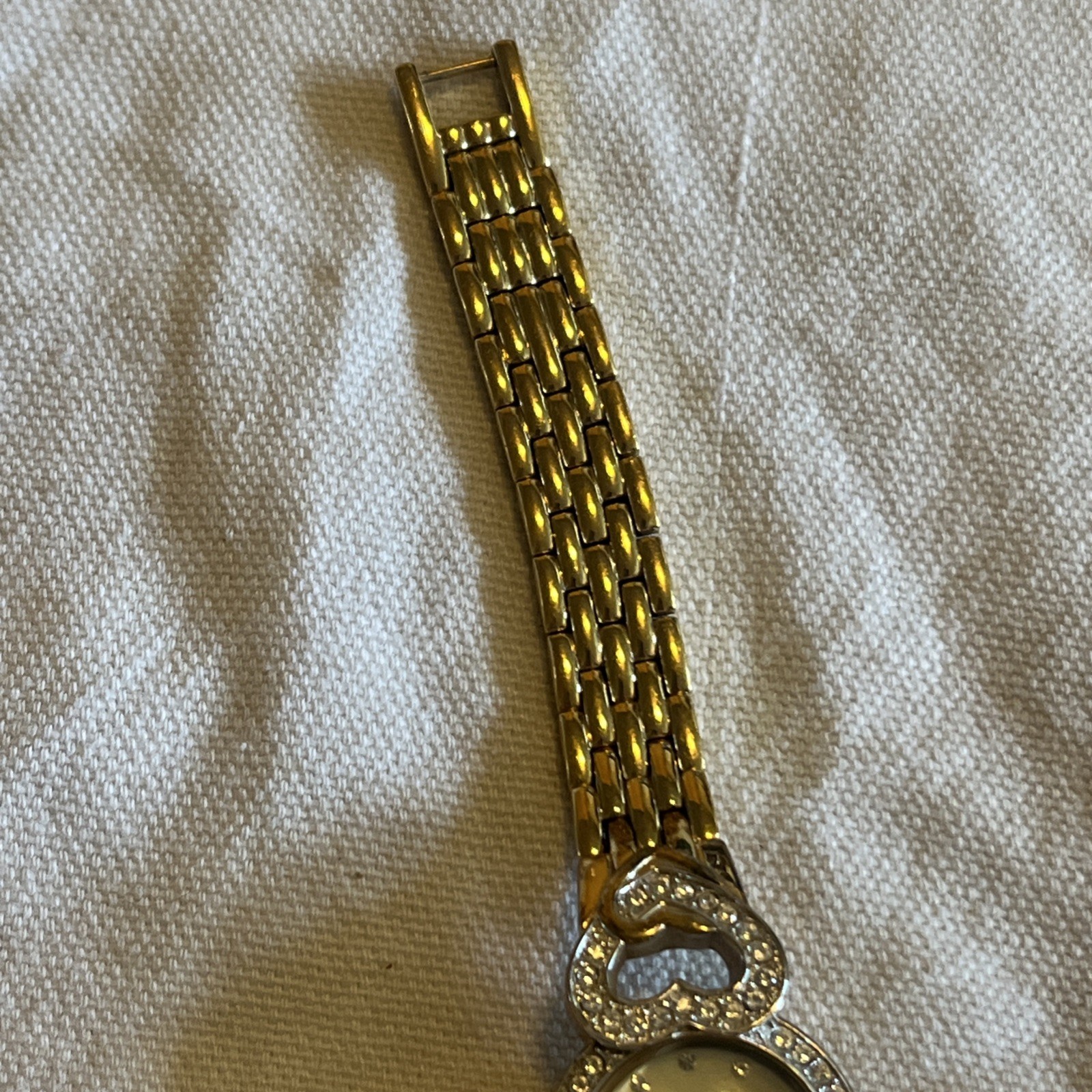 Armitron “Now” Gold-Tone Bracelet Watch – Rhinestone Hearts Accent