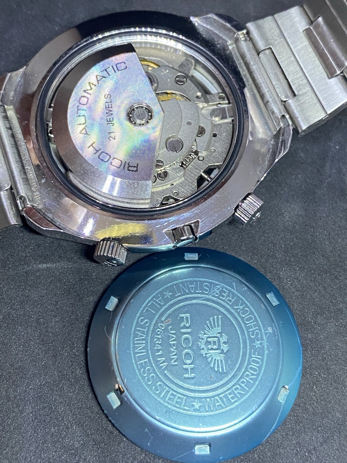 RICOH WORLD TIME AUTOMATIC DAY&DATE MEN’S WATCH 21 JEWELS