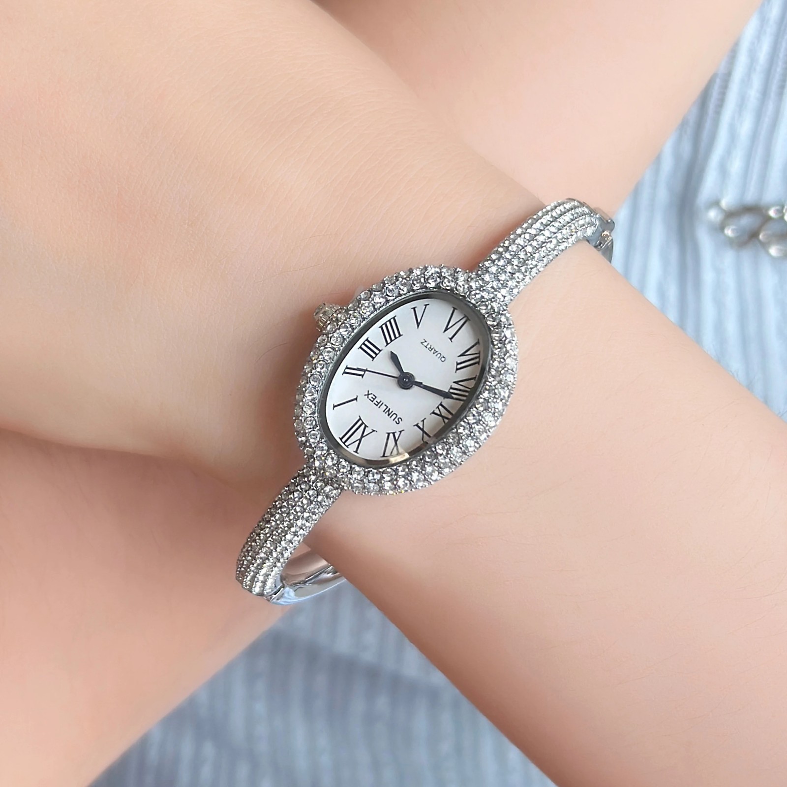 Luxury Crystal Oval Bangle Watch For Women Roman Numeral Dial Rhinestone Inlaid