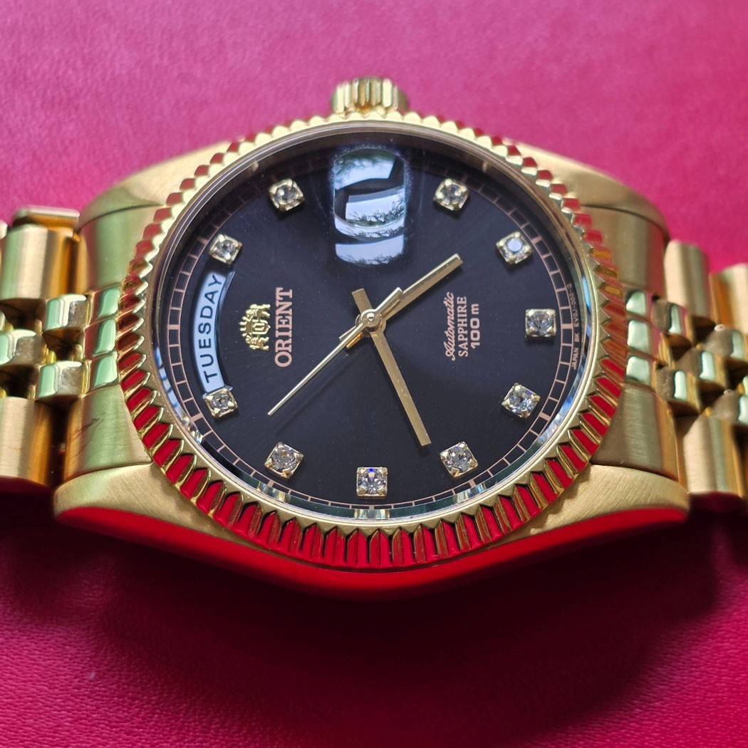 MEN’S ORIENT PRESIDENT 10 POINTS BLACK DIAL AUTOMATIC DAY DATE GOLD/SS