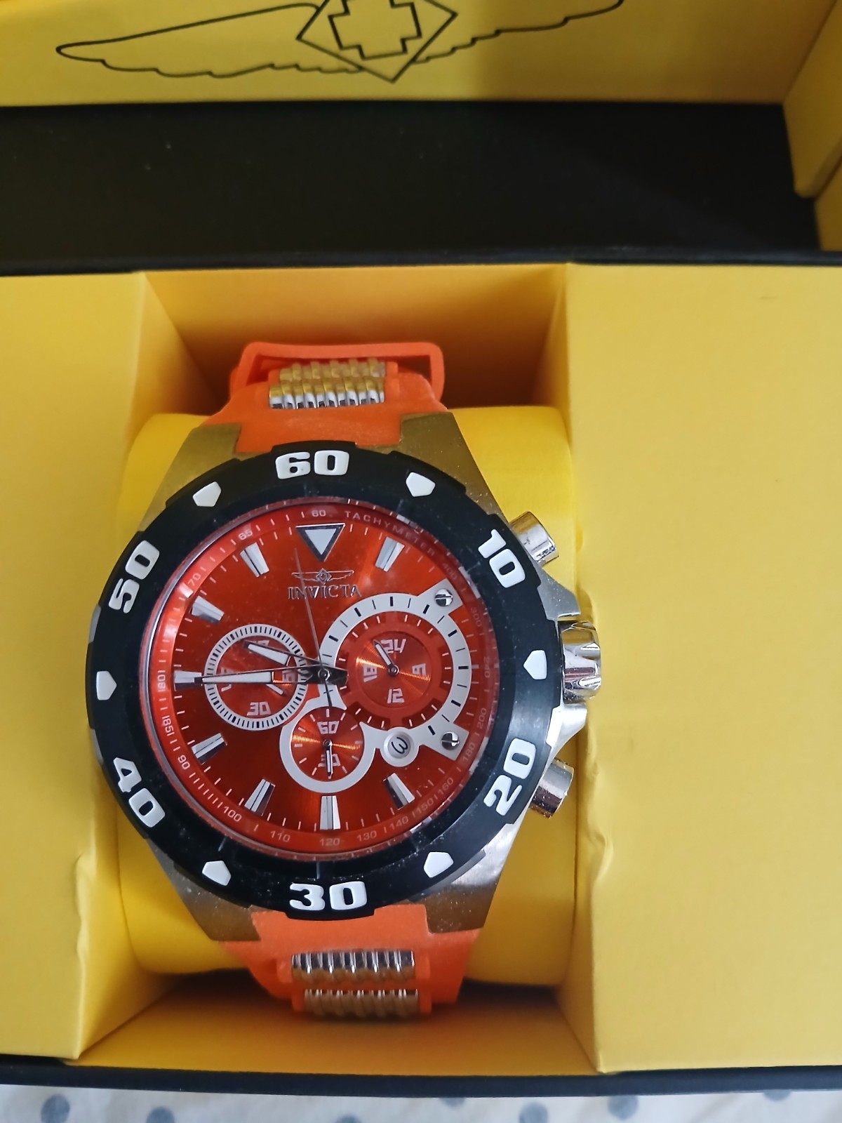 Invicta Pro Diver Men’s Quartz Chronograph Tachymeter Red Dial Orange Strap 52mm