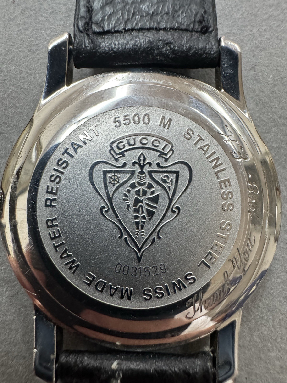 Gucci 5500 M Swiss Made Quartz Date Silver Dial Roman SS Case Black Leather