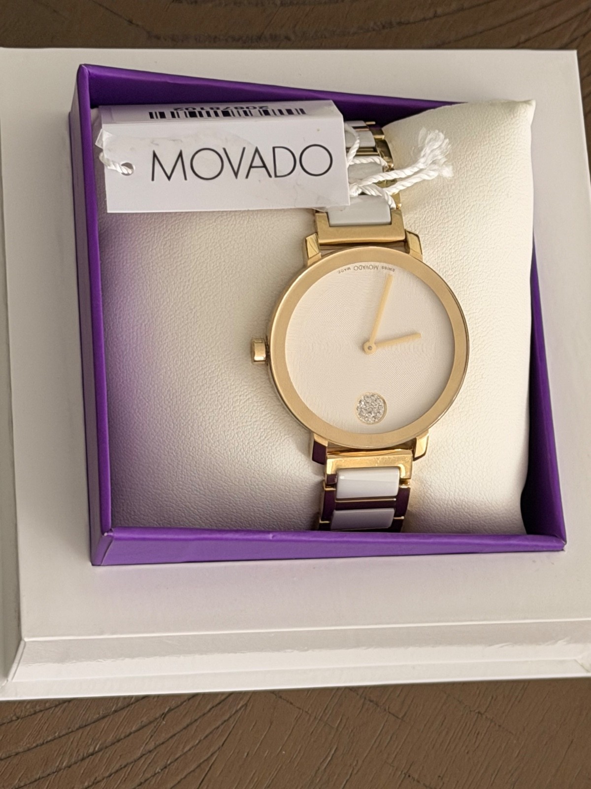 movado womens watch white and gold