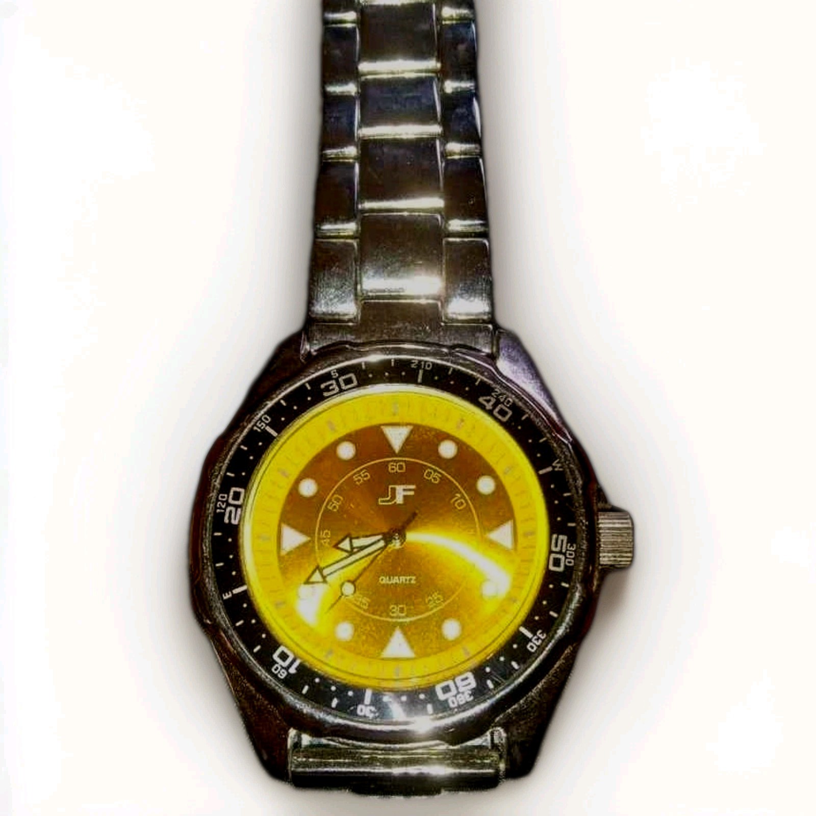 JF Quartz Analog Wristwatch Gold Dial Black Fixed Bezel Silver Bracelet