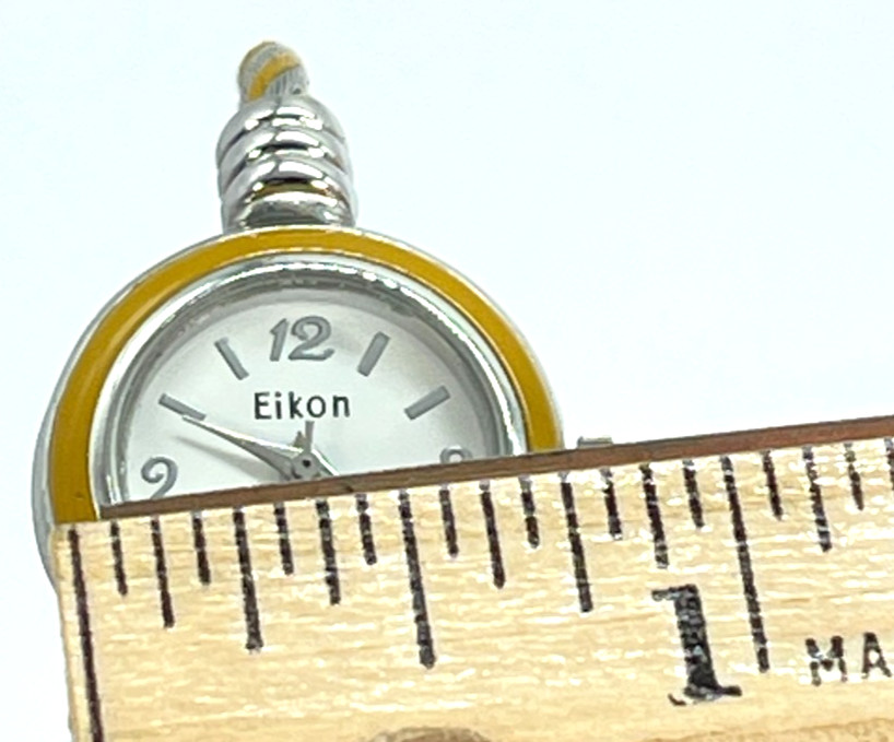 Watch Eikon Quartz White Face, Silver Numbers, 7′ Gold/Steel Twist Bracelet