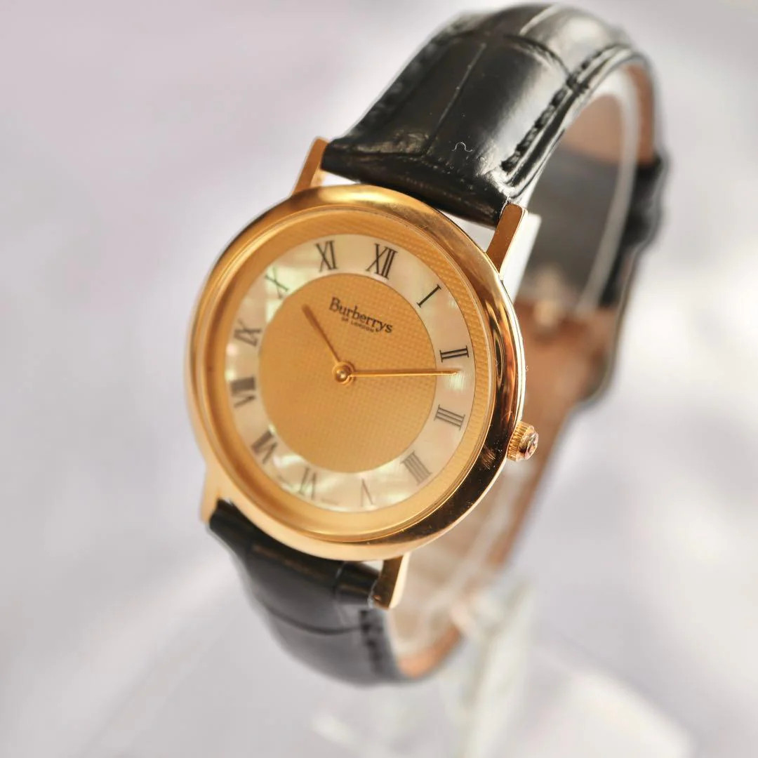 BURBERRY 34mm Gold Shell Dial Black Belt Watch