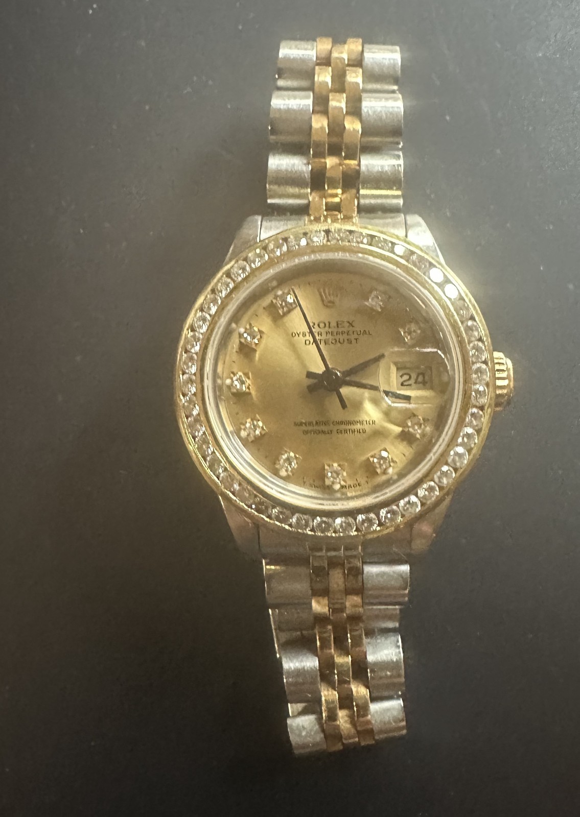 ladies rolex watch diamond dial and bezel