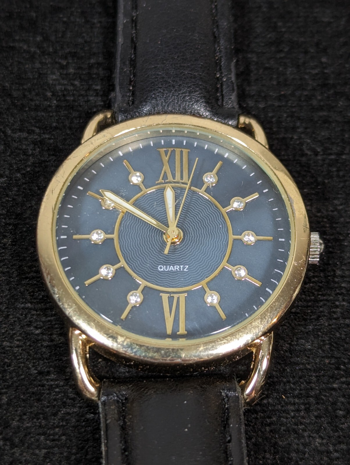 Womans Blue Gray Pearlized Dial Gold Tone Case Black Band Watch 7.5 Inch