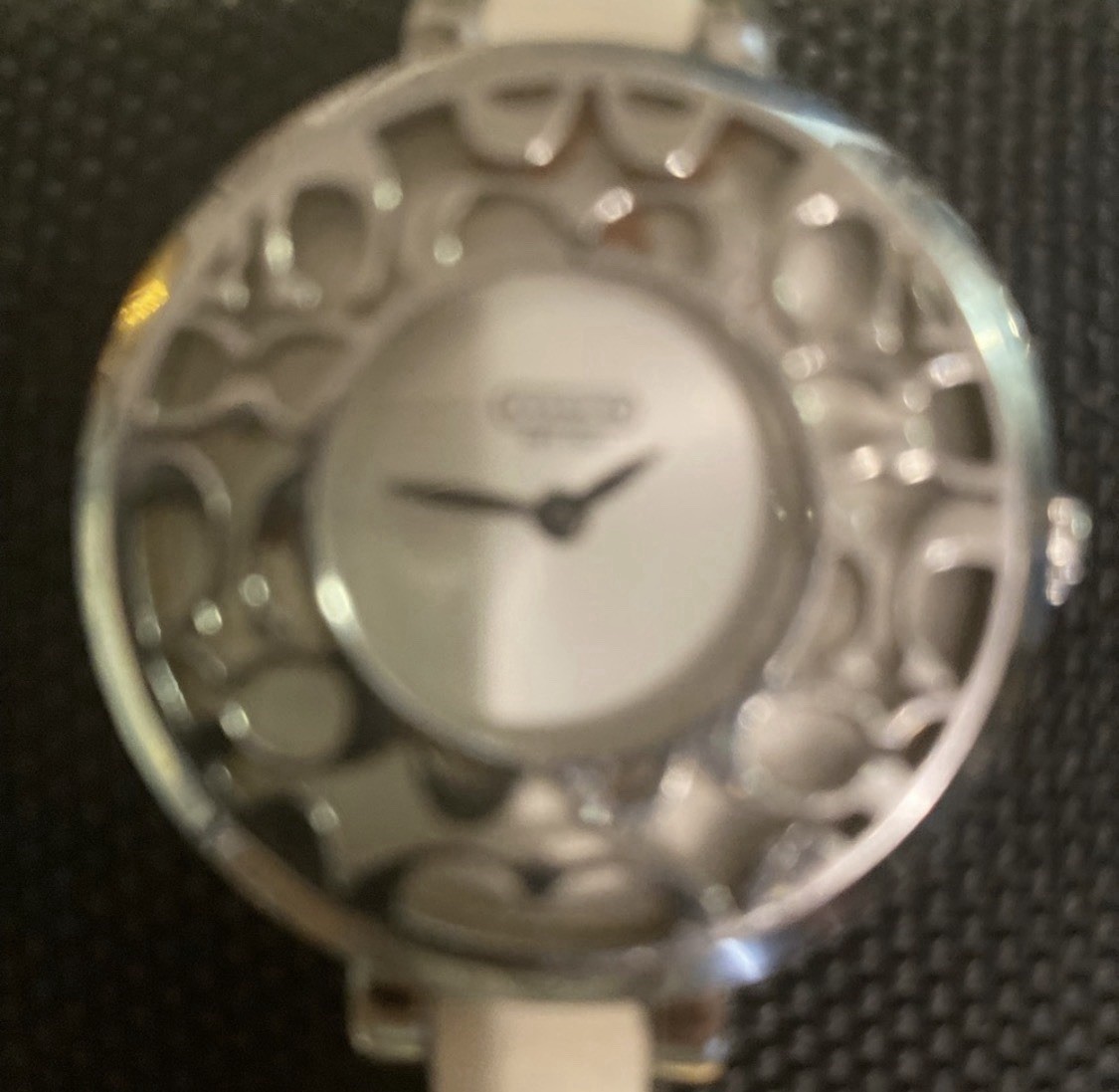Coach ladies’ Sabrina 14501433 stainless steel silver quartz watch.